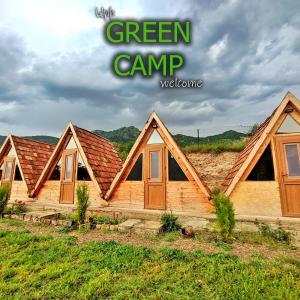 a group of homes with the words green camp at Green Camp eco-rural and civil society tourism center 