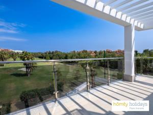 a view from the balcony of a house at Homity Holidays - Playa Granada - Aguacate Beach in Motril +172 photos
