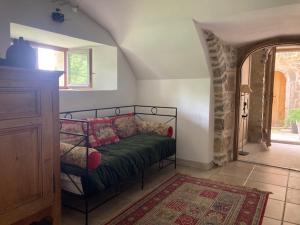 Postel nebo postele na pokoji v ubytování Mas le Nogier Gites Apartments