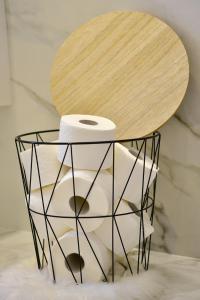 a table with a roll of toilet paper on top at Apartment Madonna in Dugopolje +56 photos