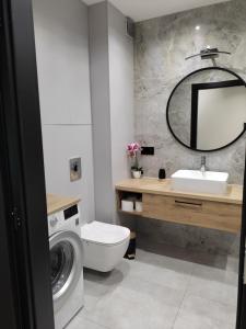 Kúpeľňa v ubytovaní Apartament Zamkowe Wzgórze