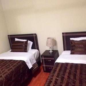 Кровать или кровати в номере B&B Cusing Wasi