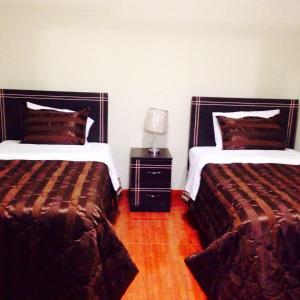 Кровать или кровати в номере B&B Cusing Wasi