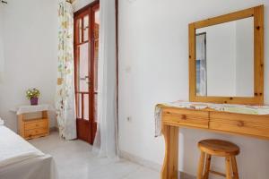 Postel nebo postele na pokoji v ubytování Areti Orfeas Apartment 5