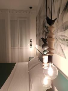 Postel nebo postele na pokoji v ubytování Corso Matteotti 162 - Affittacamere + 30 fotografií