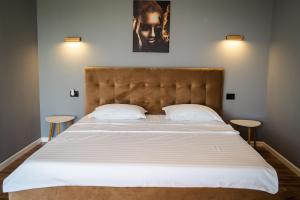 Un pat sau paturi într-o cameră la Havana Resort +83 fotografii