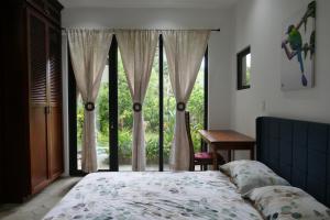 Кровать или кровати в номере Casitas Vista Verde