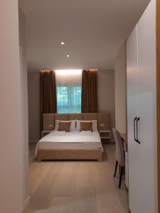 Postel nebo postele na pokoji v ubytování Solea Hotel