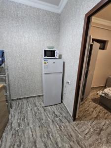 Kuchyň nebo kuchyňský kout v ubytování Туристический Дом в EVN Airport