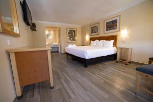 Voodi või voodid majutusasutuse Hotel Colonial Ciudad Juarez toas +24 fotot