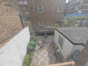 an overhead view of a courtyard with a building at 2 bedroom 2 bathroom apartment in Old St - Shoreditch - Zone 1 in London