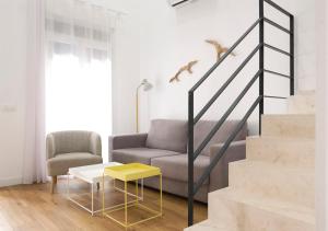 Ruang duduk di Precioso duplex con patio junto a la Catedral
