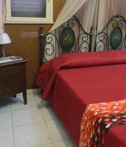 Posteľ alebo postele v izbe v ubytovaní B&B TascaPachino