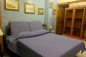 Posteľ alebo postele v izbe v ubytovaní B&B TascaPachino