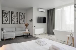 Posteľ alebo postele v izbe v ubytovaní Be The One Hotel