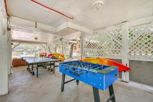 a room with two ping pong tables in it at Crystal River Retreat with Private Dock and Kayaks! in Crystal River