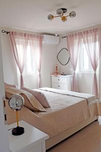 Postel nebo postele na pokoji v ubytování Casa Tenedos Corfu