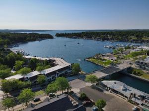 an aerial view of a marina with boats in the water at 342 Edgewater Inn in Charlevoix