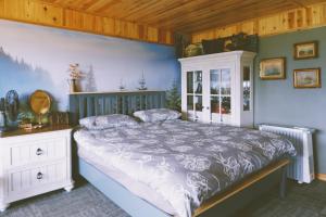 Ліжко або ліжка в номері Ta Phin Cottage