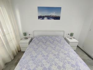 Posteľ alebo postele v izbe v ubytovaní Apartamento en primera linea del mar en Platja d'aro ARENAL