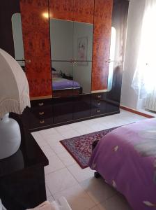 A bed or beds in a room at B&B Angels