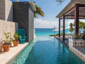 A piscina localizada em Mi Amor Tulum, a Small Luxury Hotel ou nos arredores
