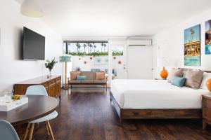 Postel nebo postele na pokoji v ubytování Del Marcos Hotel