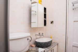 A bathroom at 2 bedroom modern house in Zomba