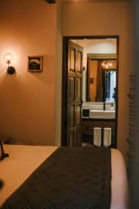 Vuode tai vuoteita majoituspaikassa Hotel Apapacho Boutique