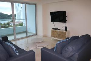 TV a/nebo společenská místnost v ubytování 6E Floor to Ceiling Oceanview Resort Panama