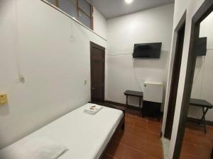 TV a/nebo společenská místnost v ubytování Hotel Malecon Puerto Berrio
