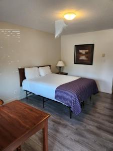 Katil atau katil-katil dalam bilik di Grantview Inn