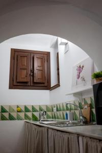 Kuchyňa alebo kuchynka v ubytovaní Patio de la Hoguera + 16 fotografií
