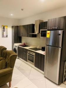 Η κουζίνα ή μικρή κουζίνα στο The VVIP Luxury Apartments @ Gardens