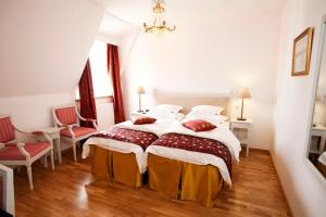 Postel nebo postele na pokoji v ubytování Brommavik Hotel