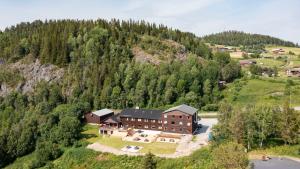 an aerial view of a house in a mountain at Austbø Hotell in Rauland