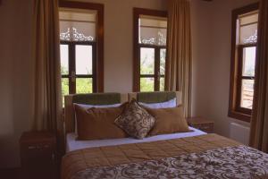 Ліжко або ліжка в номері Kanoglu Konagi Butik Otel