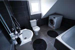 Koupelna v ubytování Vila Benetton + 3 fotografie