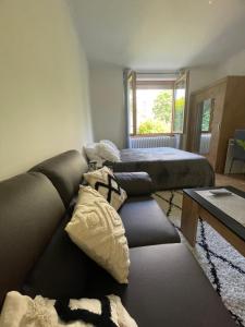 Posezení v ubytování Chambre privée vue sur le jardin proche centre ville