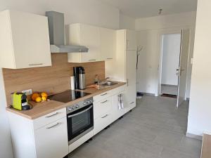 Köök või kööginurk majutusasutuses Ferienwohnung in Seenähe!