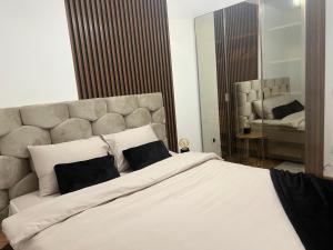 Katil atau katil-katil dalam bilik di Luxe Living