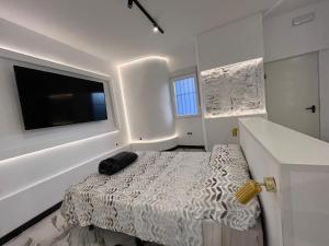 Łóżko lub łóżka w pokoju w obiekcie BS4 suite Luxury Madrid centro