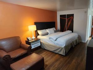 Postel nebo postele na pokoji v ubytování B&J HOTEL AND APARTMENTS