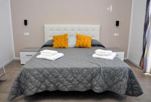Postel nebo postele na pokoji v ubytování Kamome Rooms
