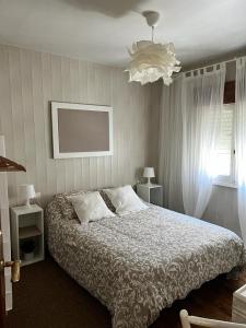 Postel nebo postele na pokoji v ubytování Casa Ángeles