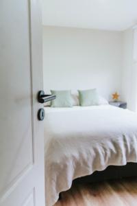 En eller flere senge i et værelse på Madero departamentos