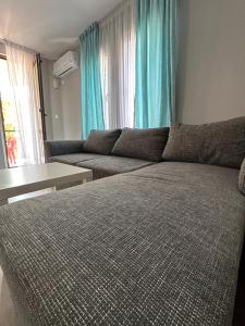 A bed or beds in a room at La Kameya