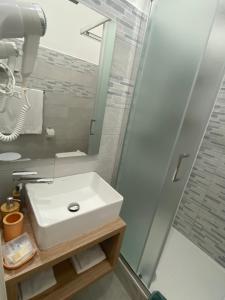 Koupelna v ubytování Titi Rooms
