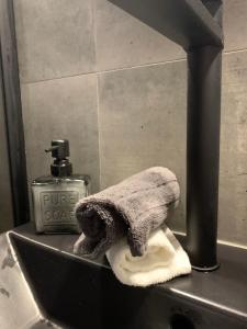 a towel sitting on a sink in a bathroom at Casa di Giacobbe Loft apartment Amalfi in Frýdlant nad Ostravicí