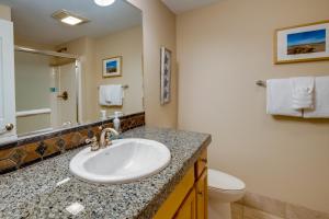 a bathroom with a sink and a toilet at Rockaway Beach Vacation Rental Near Beach Access! in Rockaway Beach +16 photos